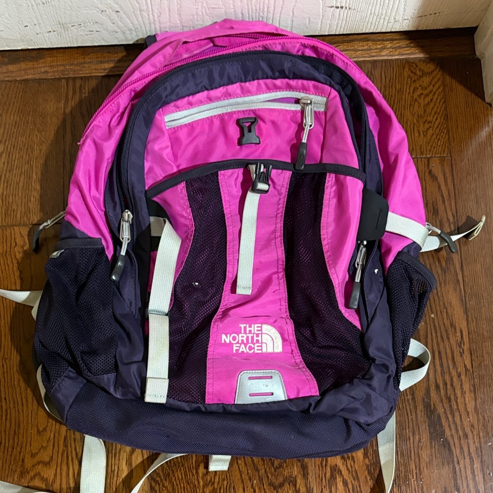 The North Face Magenta and Black Backpack